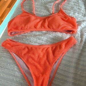 Women’s orange bikini size L